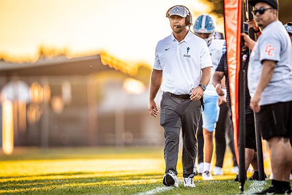 CdM head coach Kevin Hettig calling shots from the sideline.