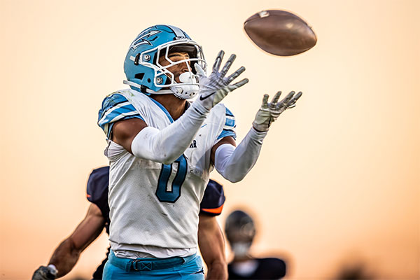 Dorsett Stecker (#0) reaching out to secure the pass.