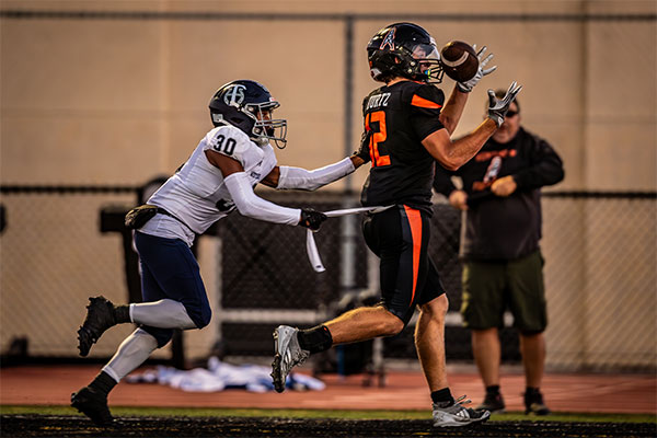 Steel Kurtz (#12) blows passed the defender for a gain of yards.