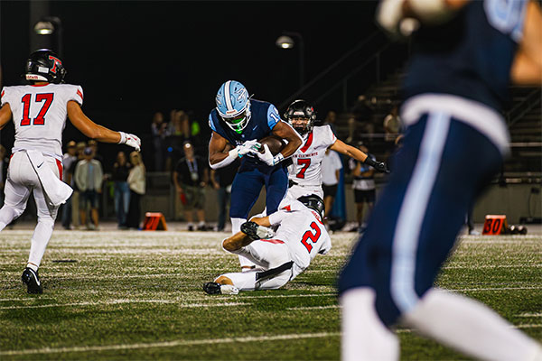 CdM ball carrier breaking the tackle.