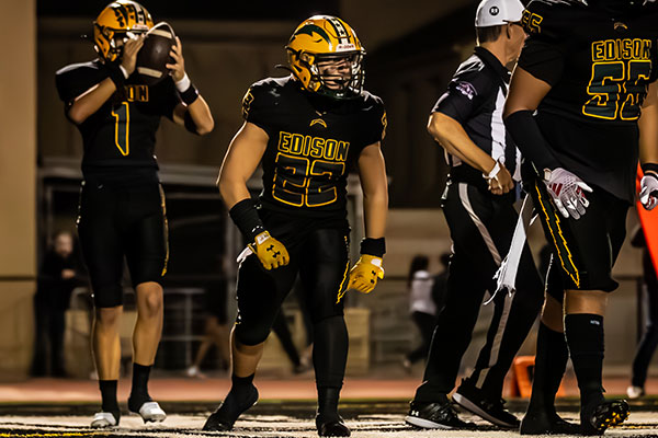 Jordan Pelaez (#1), Jeremiah Ross (#22), and Devyn Blake (#55) looking like a force to reckoned with.