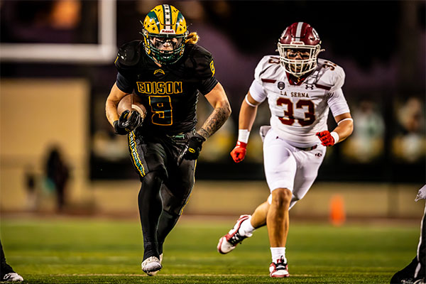 Julius Gillick (#9) rushing for another text book touchdown.