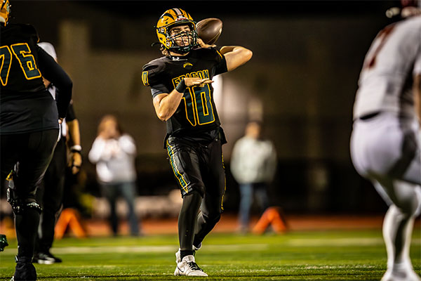 Sam Tomson (#10) ready to drop a bomb on his open receiver.