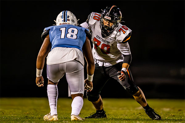 Giovanni Truong (#70) attacking his defender.