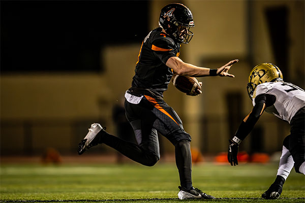 HB-x-E--HB-ball-carrier-going-for-stiff-arm