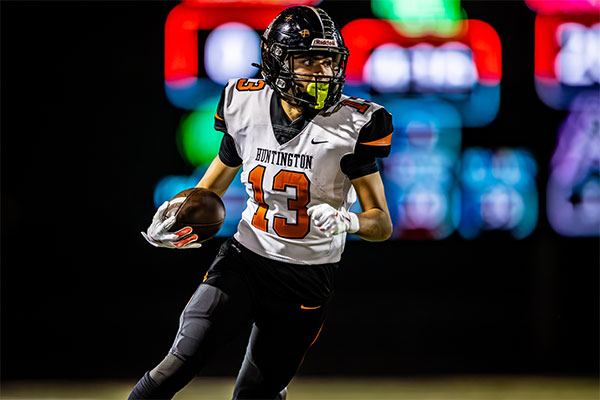 Faris Shehadeh (#13) turning up field for a gain of yards.